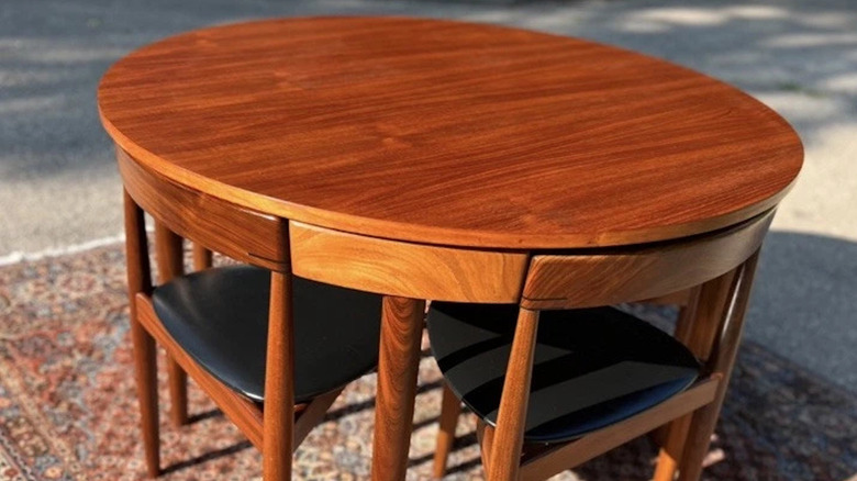 A Hans Olsen roundette dining set listed for sale.