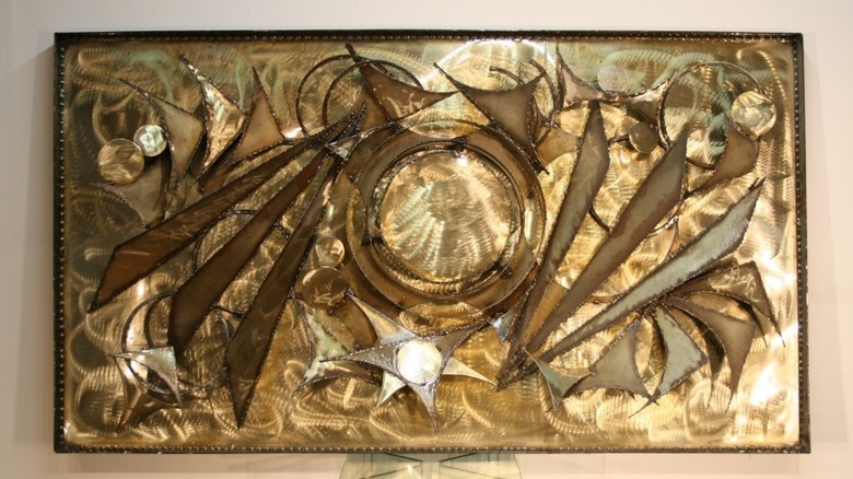 A heavy metal panel wall sculpture by Danish metal artist Henrik Horst from the 1970s.