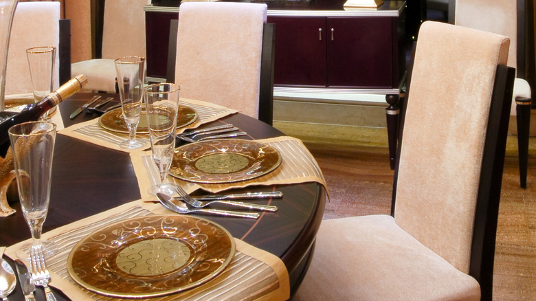 Dining table with lacquer chinoiserie finish