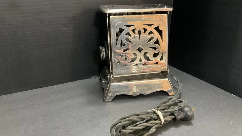 An antique Hotpoint toaster with an Art Deco design