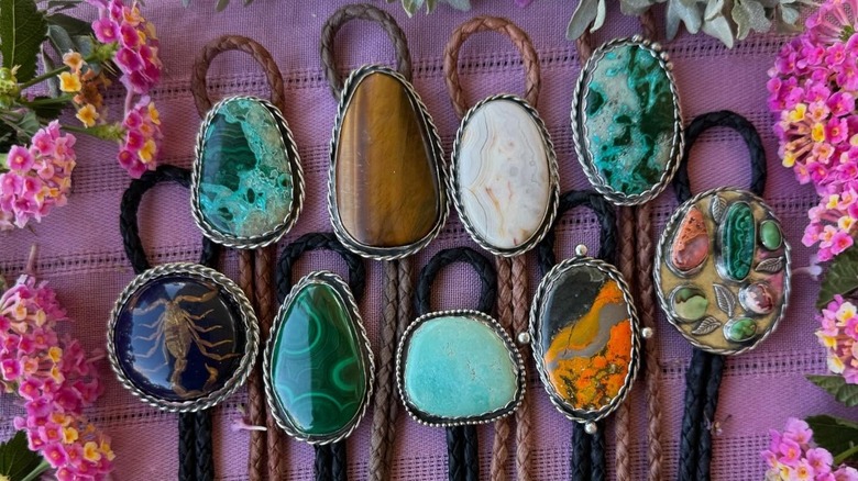 Bolo ties framed by florals