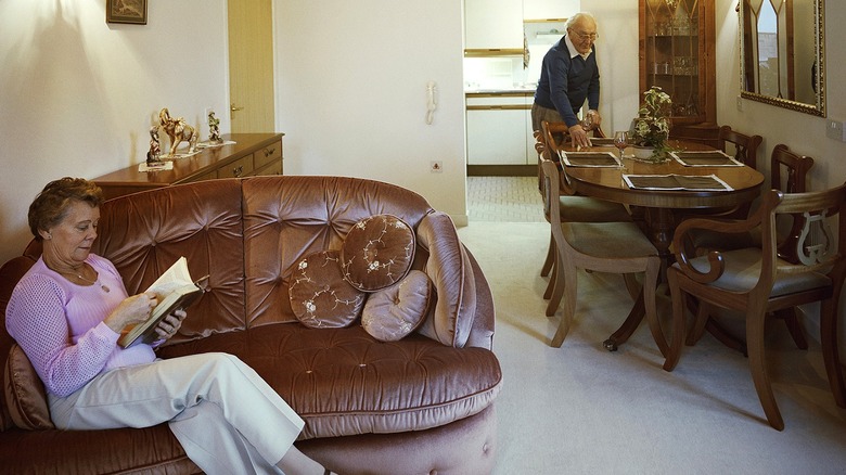 Two people in a 1980s styled home