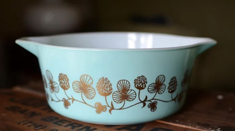 A Clover Berry Pyrex bowl on an upcycled timber tabletop.