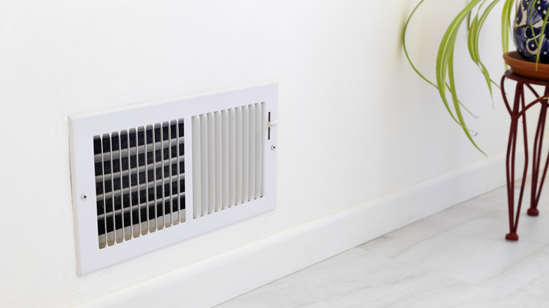 an air vent placed near the floor