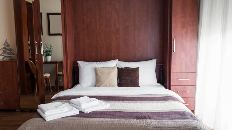 decorated bed within wardrobe