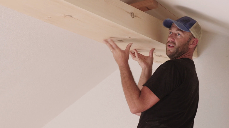 Dave Marrs installing faux beam
