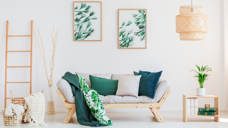 Neutral couch with green accents