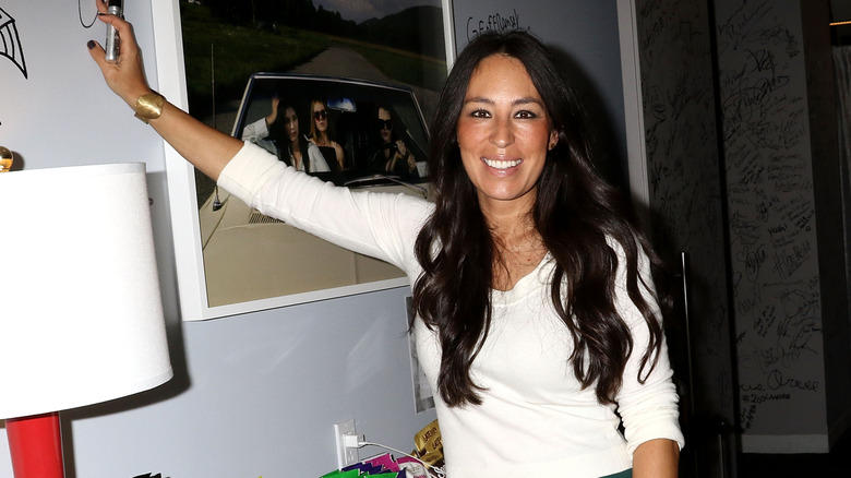Interior designer Joanna Gaines poses, smiling, for a photograph