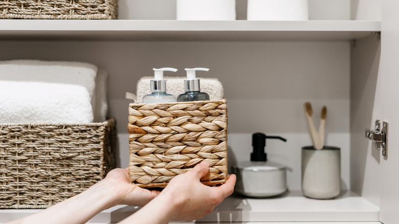 An organized bathroom shelf.