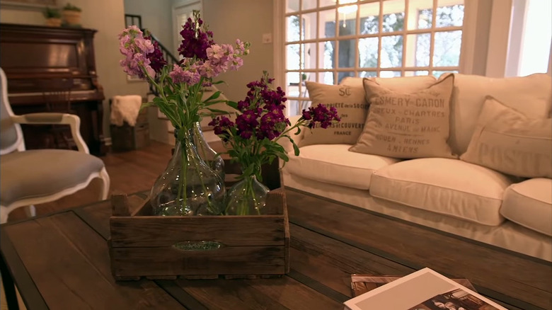 Joanna Gaines explaining how to arrange flowers.
