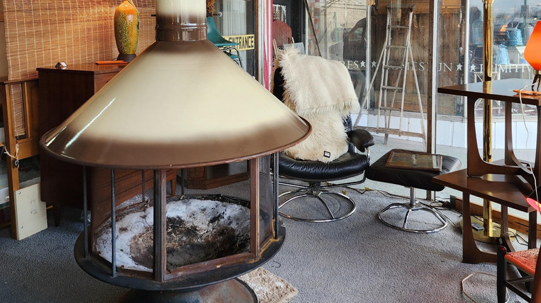 Carousel fireplace in retro room