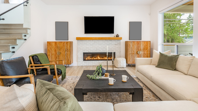 Living room with sectional sofa and fireplace