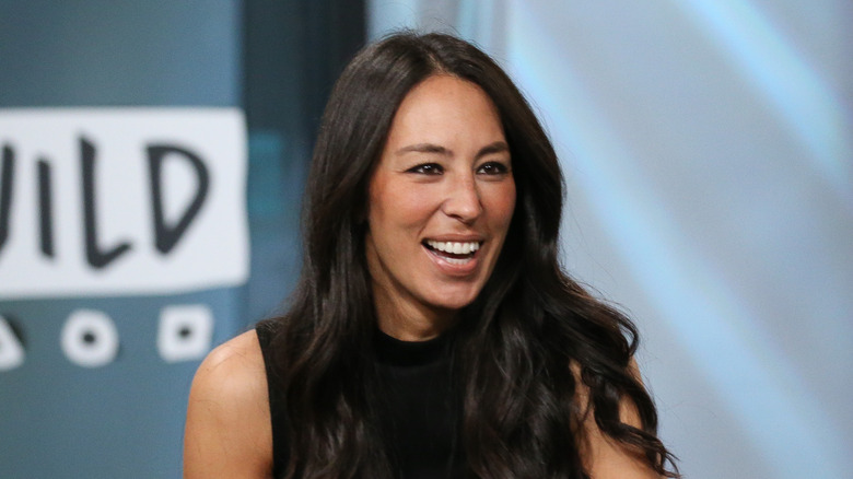 Joanna Gaines sitting down at a panel interview