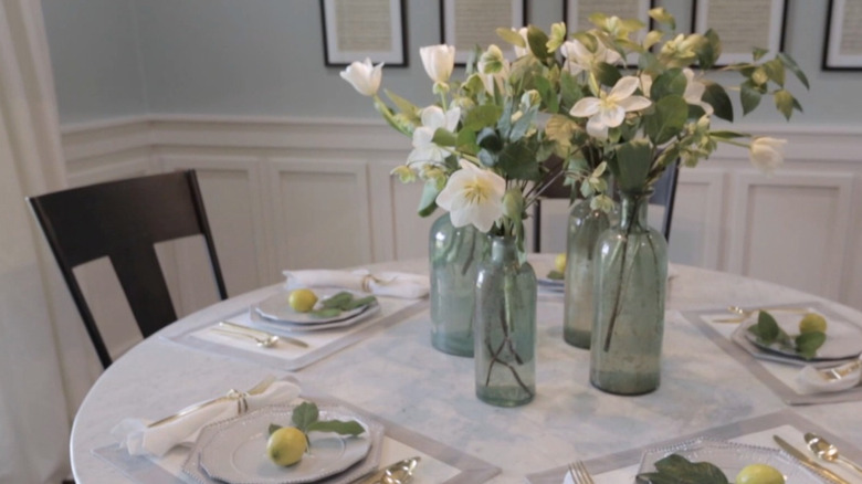 Dining room table with flowers.