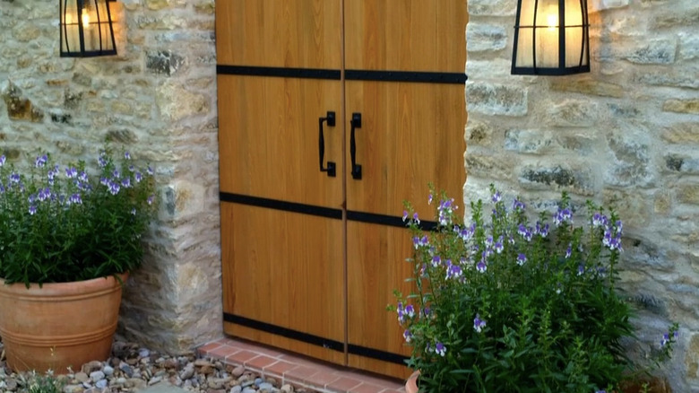 Potted plants at a front door.