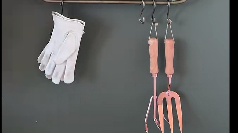 Hanging gardening tools.