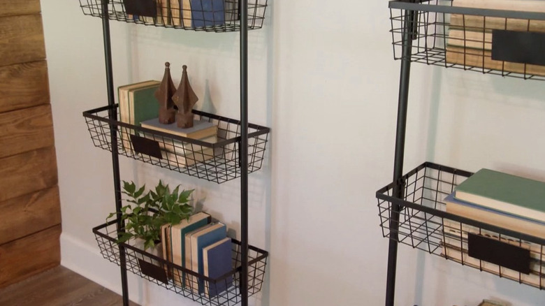 Baskets hanging on a wall.