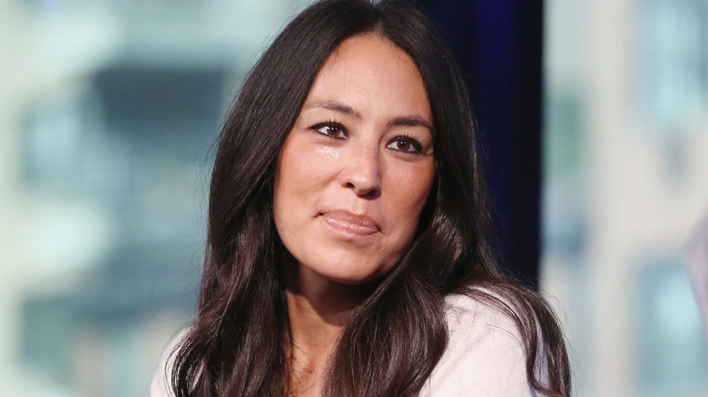Joanna Gaines being interviewed at an event.