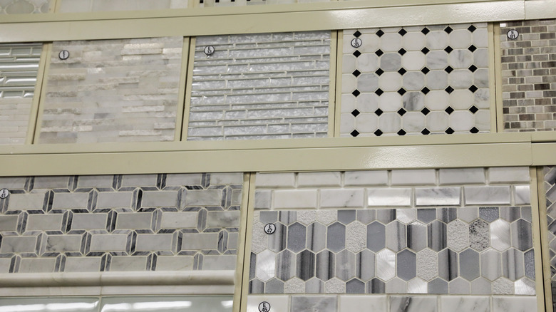 Kitchen backsplash samples on wall