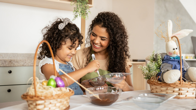 mom and daughter making a DIY