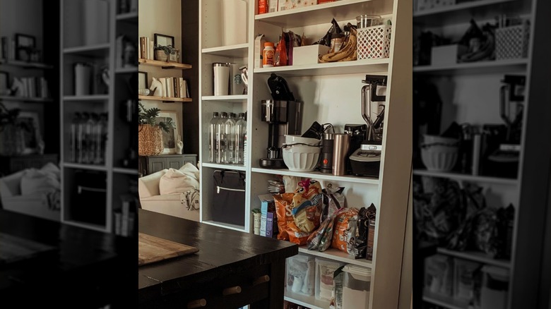 Kitchen appliance storage using the BILLY bookcase.