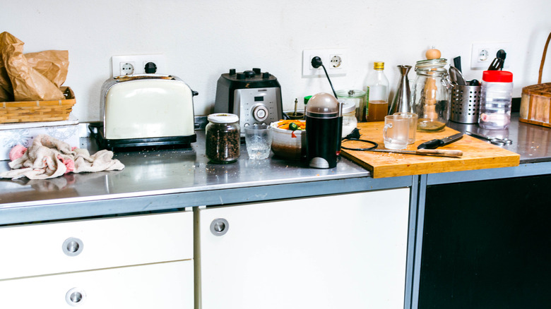 Cluttered kitchen counters.