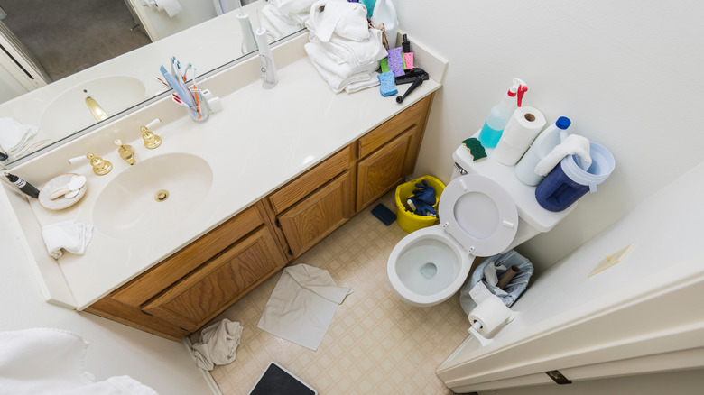 cluttered bathroom counter