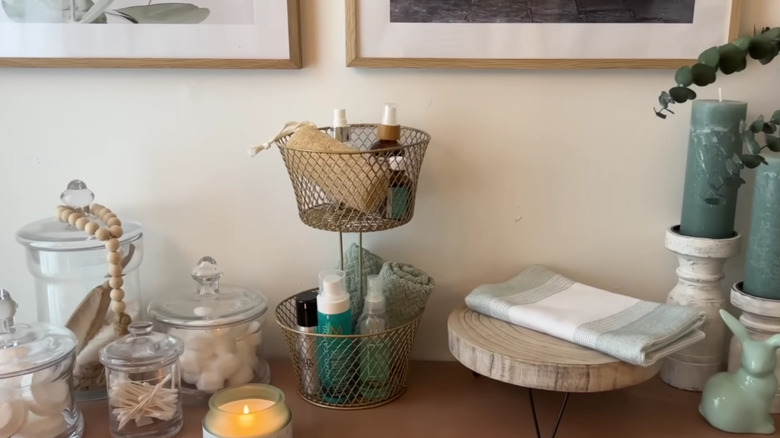 A gold metal stand sitting on a counter.