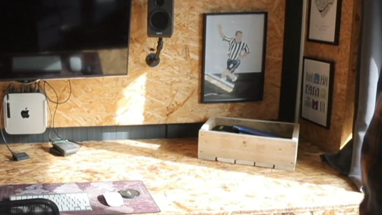 a wood storage box made from pallet wood on a work bench