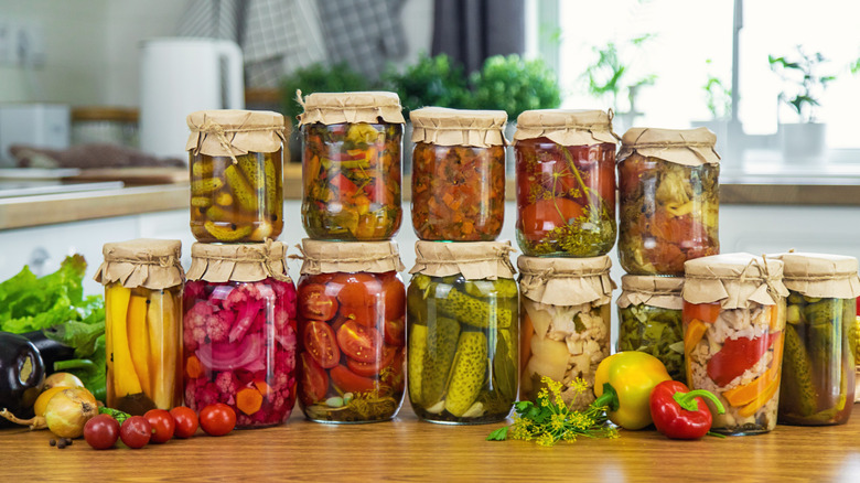 A range of preserved vegetables on kitchen counter