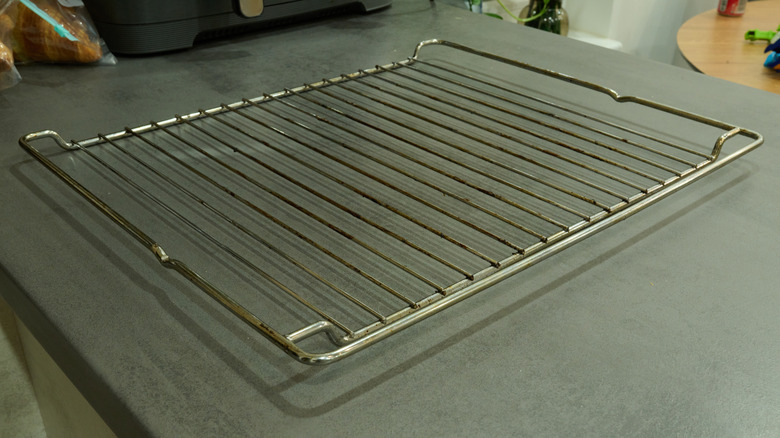 Keep Garage Clutter Organized With A Dollar Tree Cooling Rack Solution