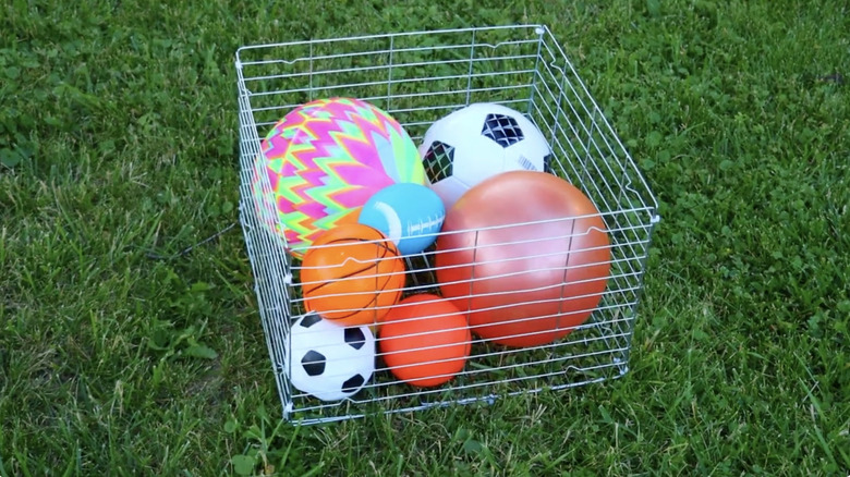 A DIY storage crate made from cooling racks.