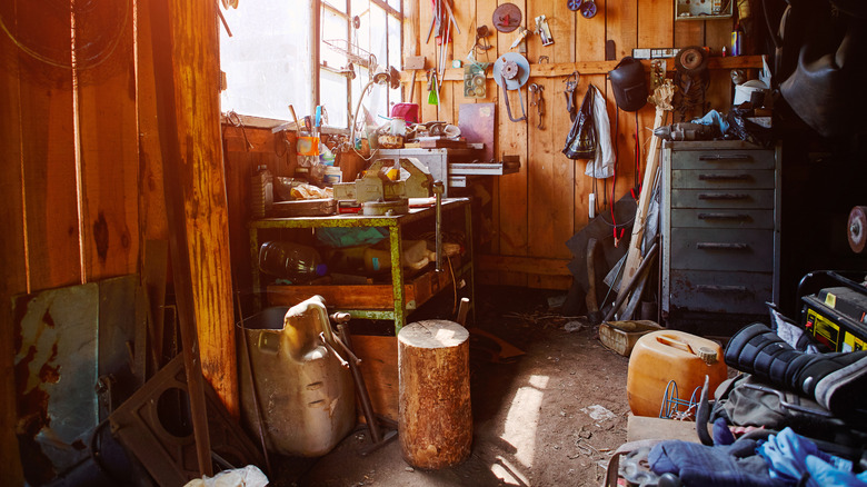 Wooden garage with a variety of tools