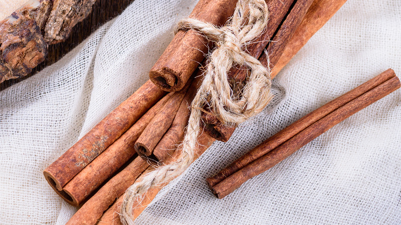 cinnamon sticks on cheesecloth