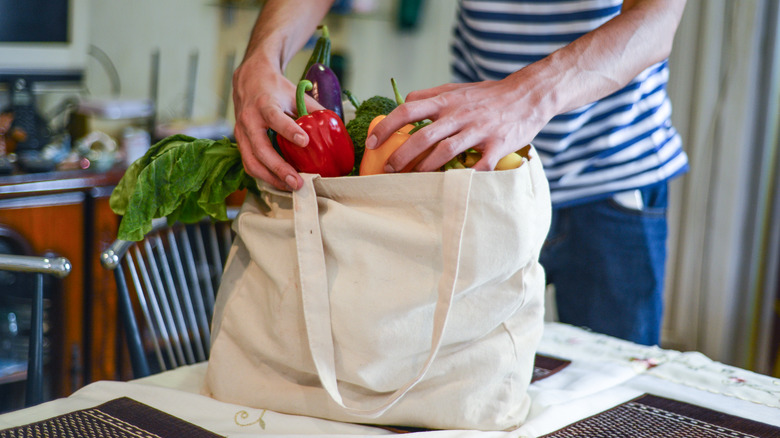 unpacking reusable shopping bag