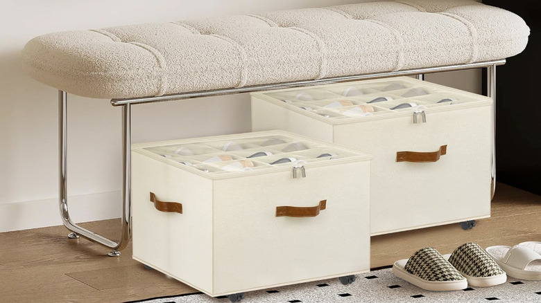 Two beige organizers under a bench