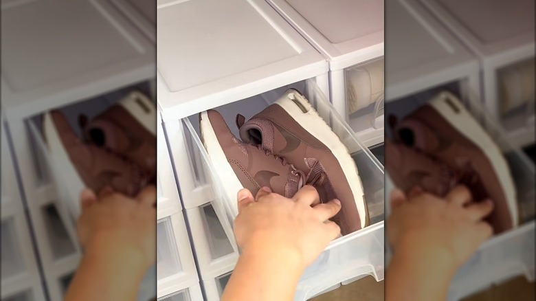 placing sneakers inside dollar tree drawer