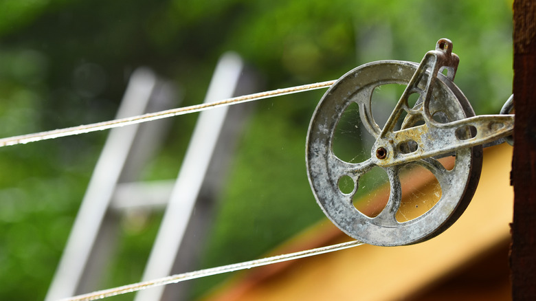 Close-up of an outdoor pulley-style clothes line
