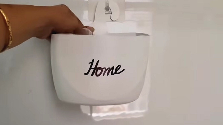 DIY hanging storage basket on a wall hook