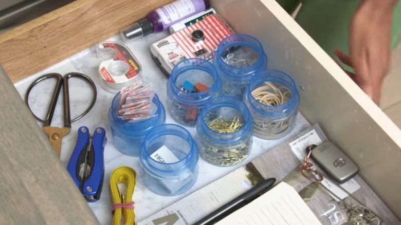 Drawers organized with detergent caps
