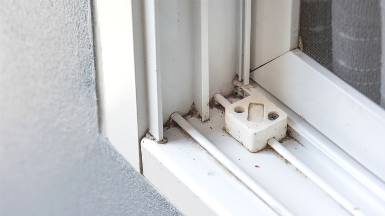 outside view of dirty window tracks