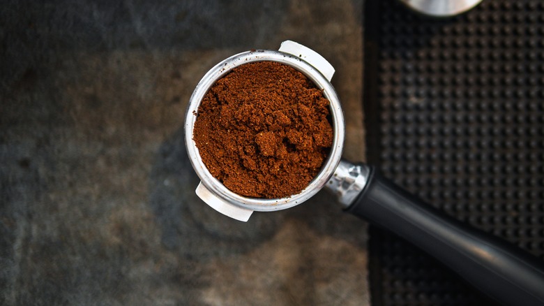 scoop of fresh coffee grounds