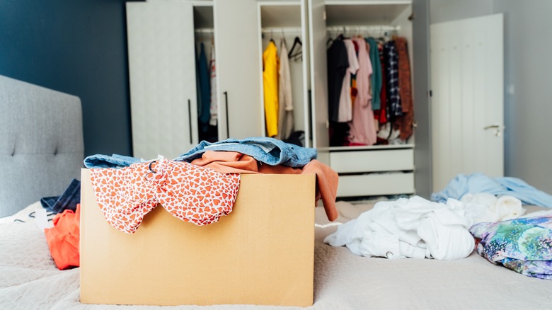 Box of clothes in bedroom