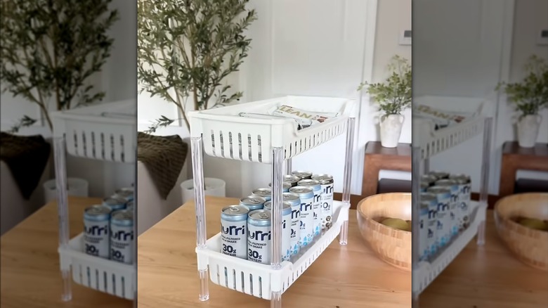 Dollar Tree 2-tier stackable rack featured on kitchen counter storing health sodas and snacks
