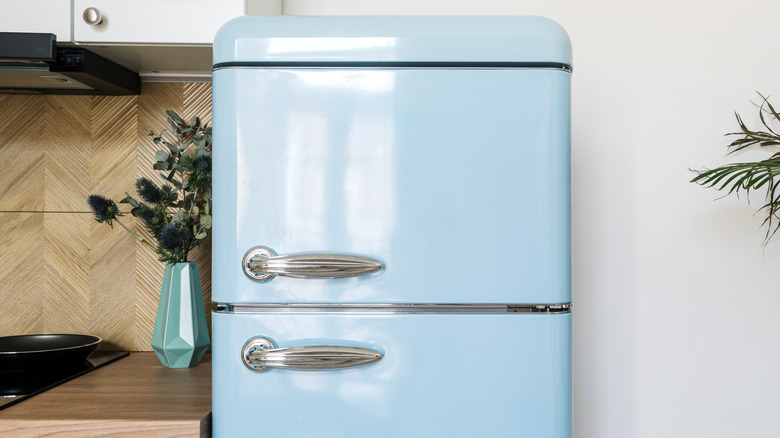 closeup of blue retro refrigerator
