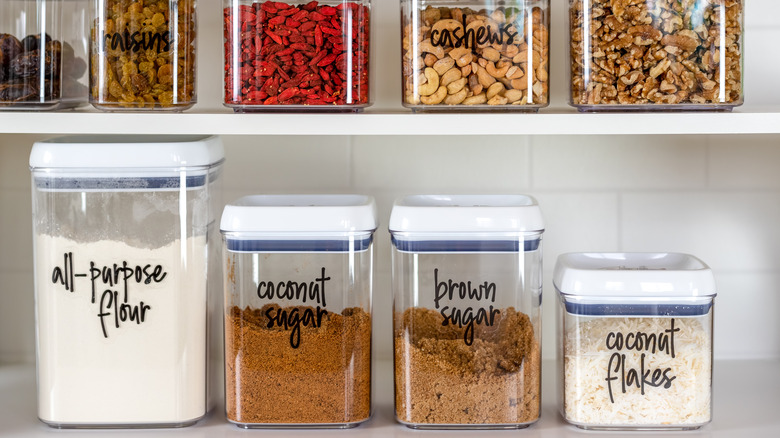 Pantry bins labeled with marker