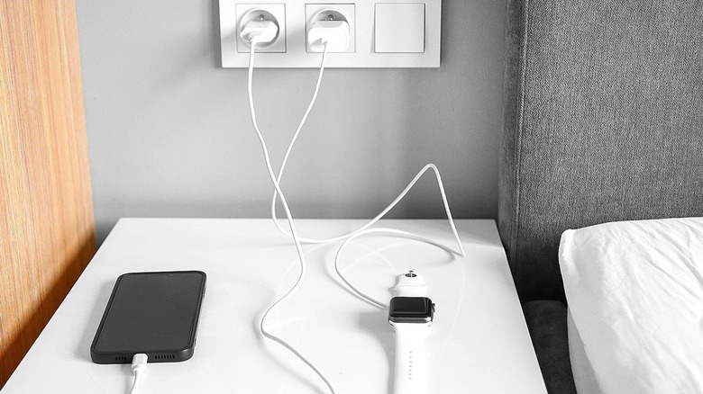 Gadgets charging on a table