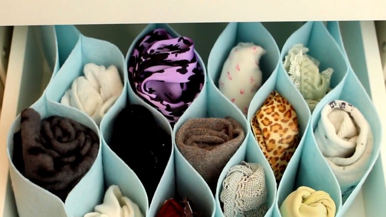 DIY accordion drawer organizer filled with socks and underwear