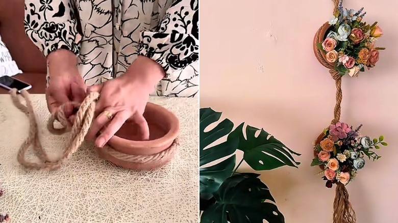 A hanging planter made out of a terracotta plant with pastel faux flowers inside.