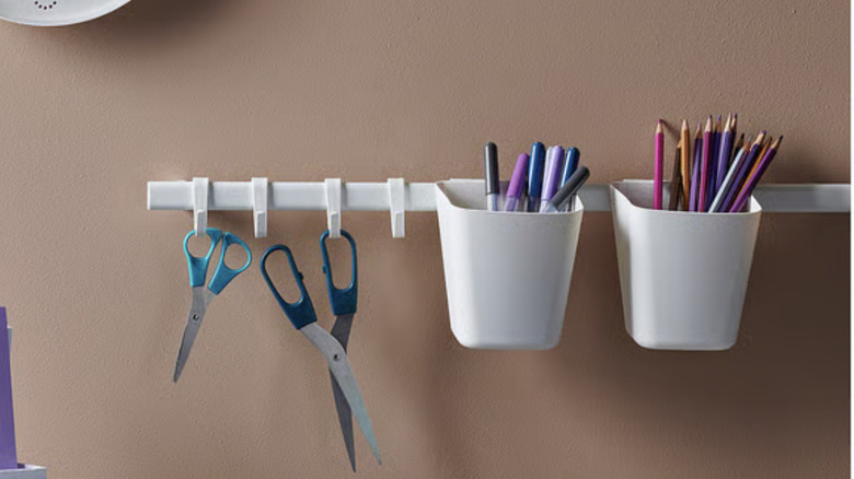 IKEA SUNNERSTA holding art supplies